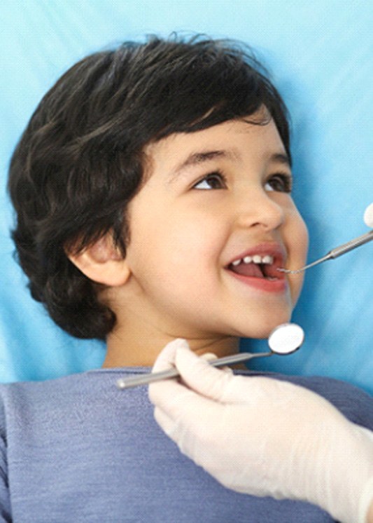 A little boy at the dentist
