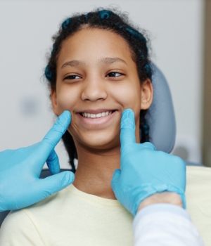 Young patient smiling in mirror