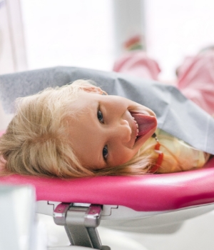 Young patient sticking out tongue