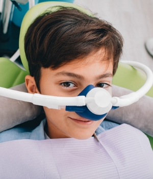 Young patient smiling under dental sedation