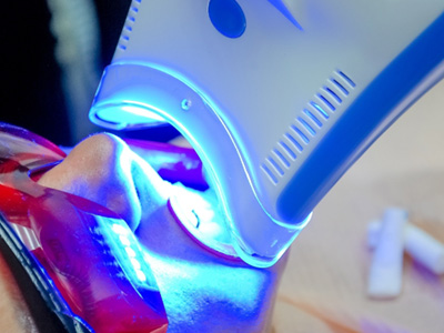 Teen relaxing in dental chair before whitening 